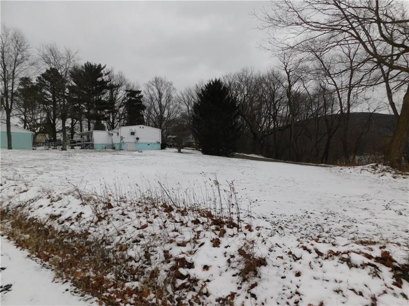 - Elizabeth Street Hopwood, PA 15445 - Photo 3 of 5 a view of a covered with snow on the road
