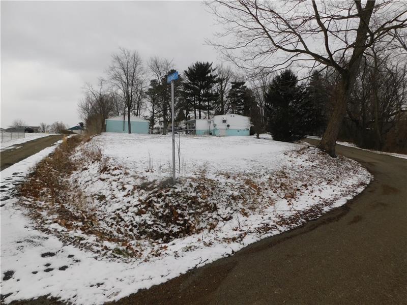 - Elizabeth Street Hopwood, PA 15445 - Photo 5 of 5 a view of a yard covered in snow