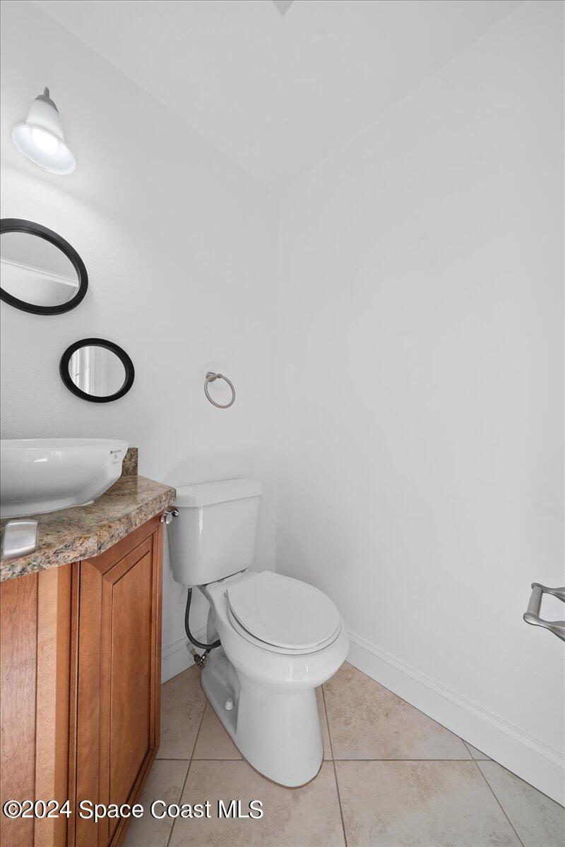 1469 Rockledge Drive Rockledge, FL 32955 - Photo 13 of 67 a bathroom with a toilet and a shower