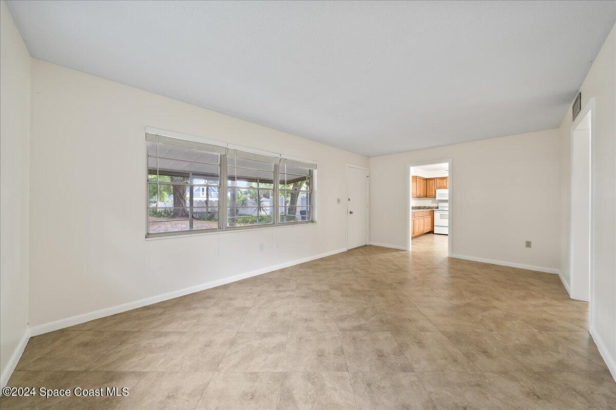 1469 Rockledge Drive Rockledge, FL 32955 - Photo 38 of 67 an empty room with windows