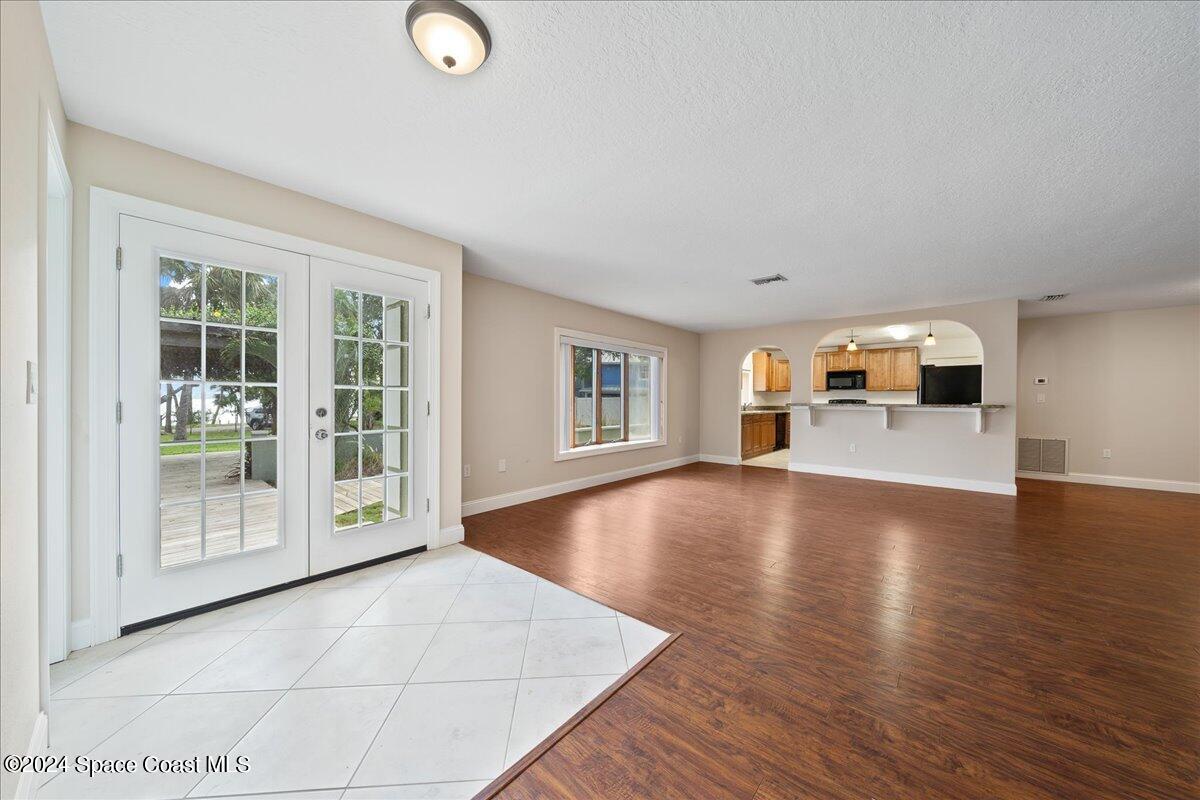 1469 Rockledge Drive Rockledge, FL 32955 - Photo 4 of 67 a view of a livingroom with furniture wooden floor and window