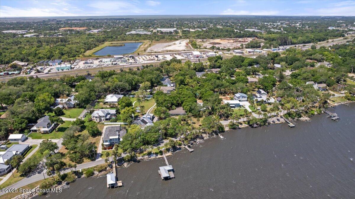 1469 Rockledge Drive Rockledge, FL 32955 - Photo 50 of 67 an aerial view of a city with lots of residential buildings