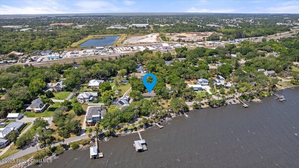 1469 Rockledge Drive Rockledge, FL 32955 - Photo 51 of 67 an aerial view of a city with lots of residential buildings