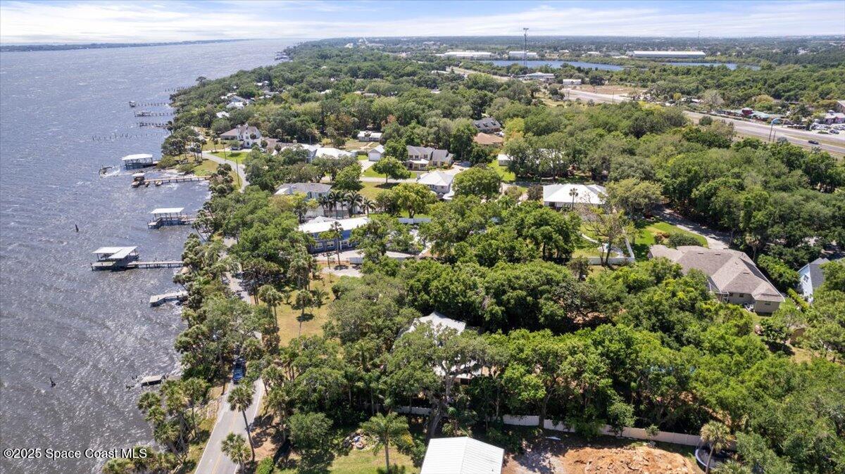 1469 Rockledge Drive Rockledge, FL 32955 - Photo 54 of 67 an aerial view of a house with a yard
