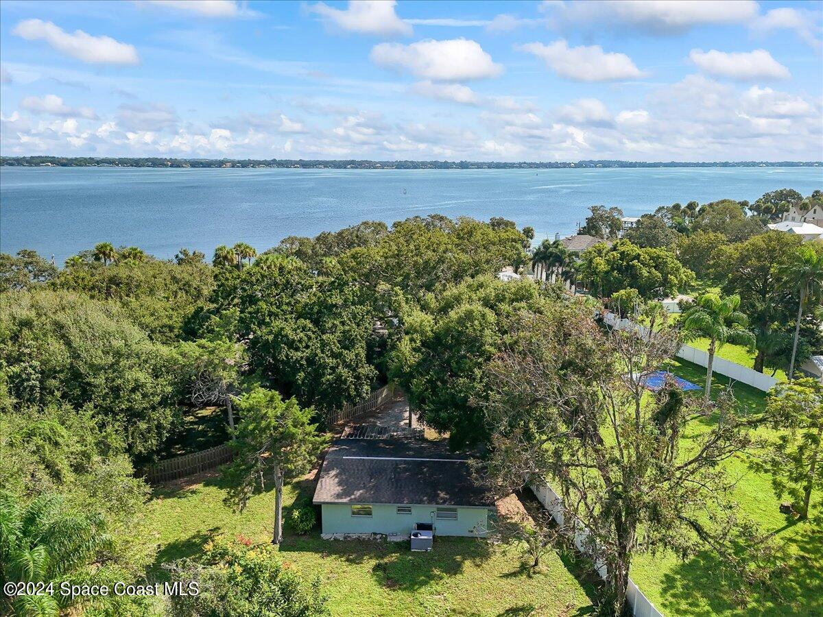 1469 Rockledge Drive Rockledge, FL 32955 - Photo 59 of 67 a view of a lake with a yard