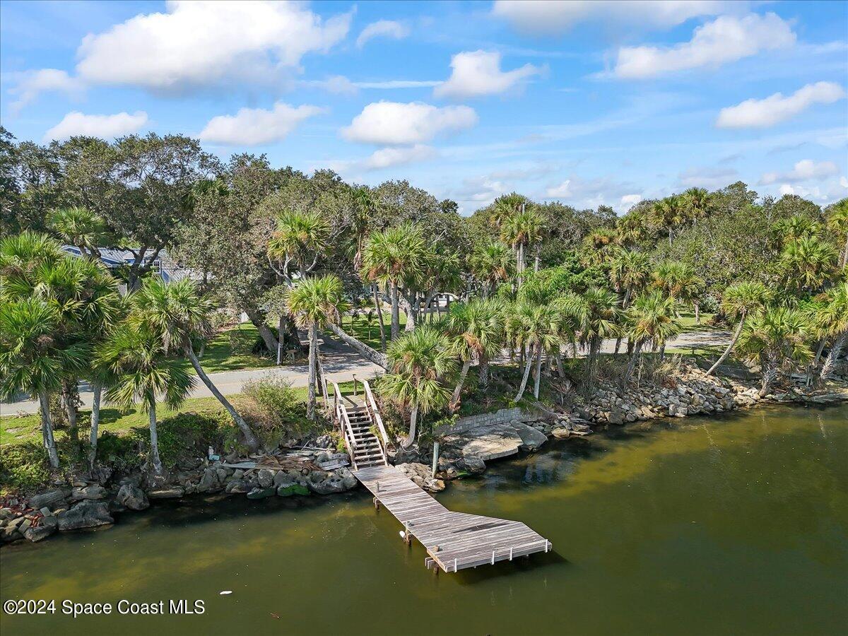 1469 Rockledge Drive Rockledge, FL 32955 - Photo 64 of 67 a view of a lake with houses
