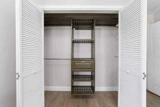 a view of front door with wooden floor