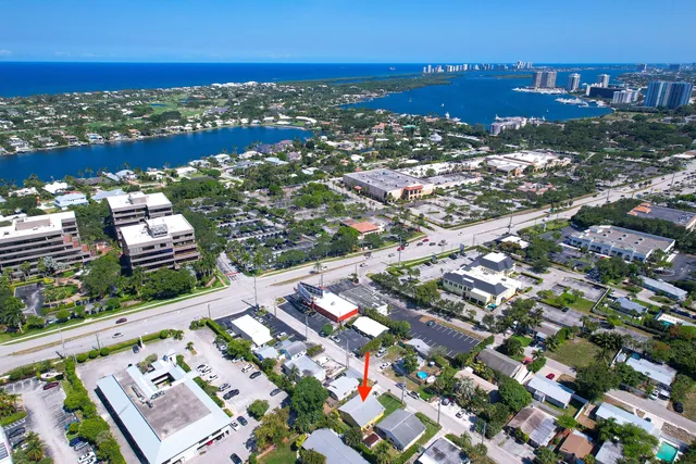 a view of city with ocean