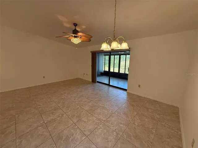 a kitchen with a stove and a refrigerator