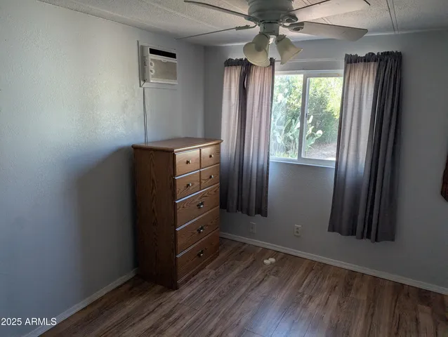 a view of a workspace with furniture
