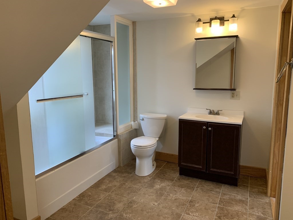 159 Chapman Street Greenfield, MA 01301 - Photo 23 of 36 a bathroom with a toilet sink and mirror