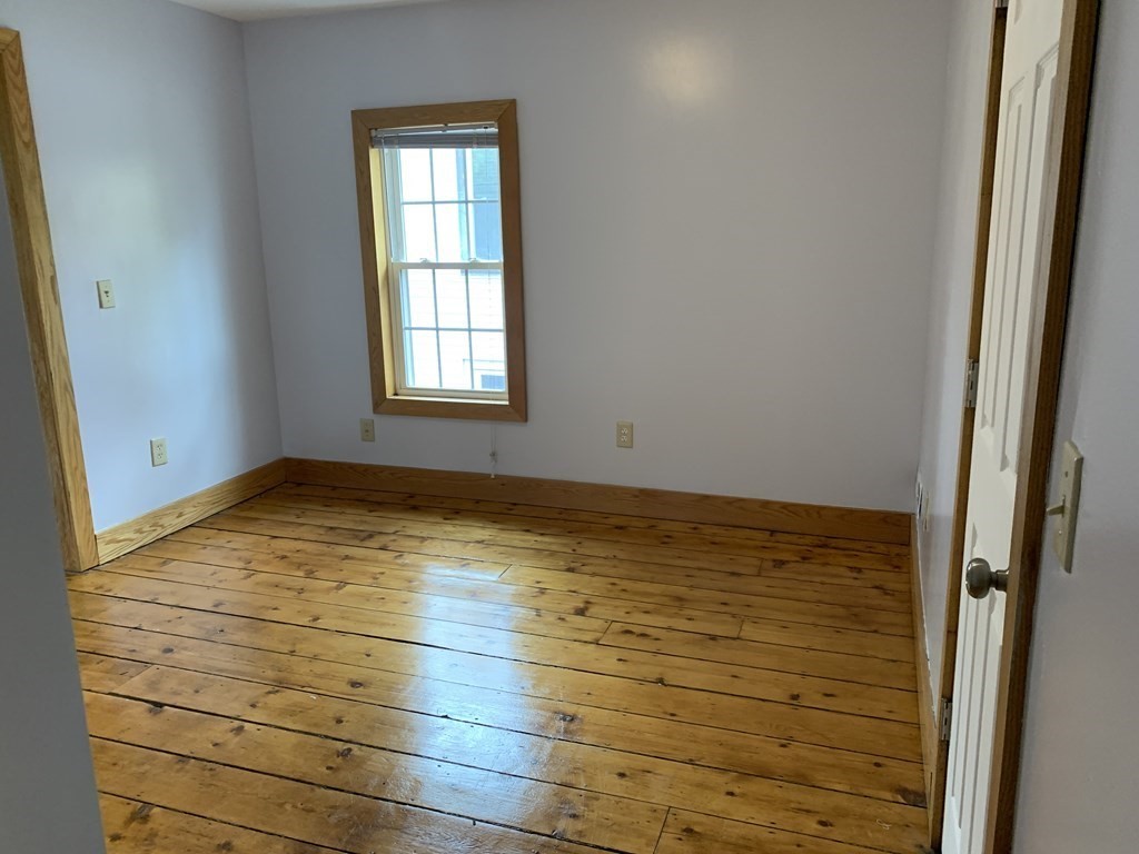 159 Chapman Street Greenfield, MA 01301 - Photo 27 of 36 a view of empty room with window