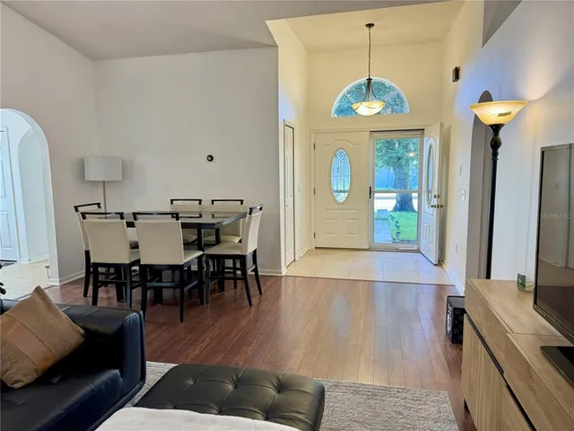 a bedroom with a bed and dresser