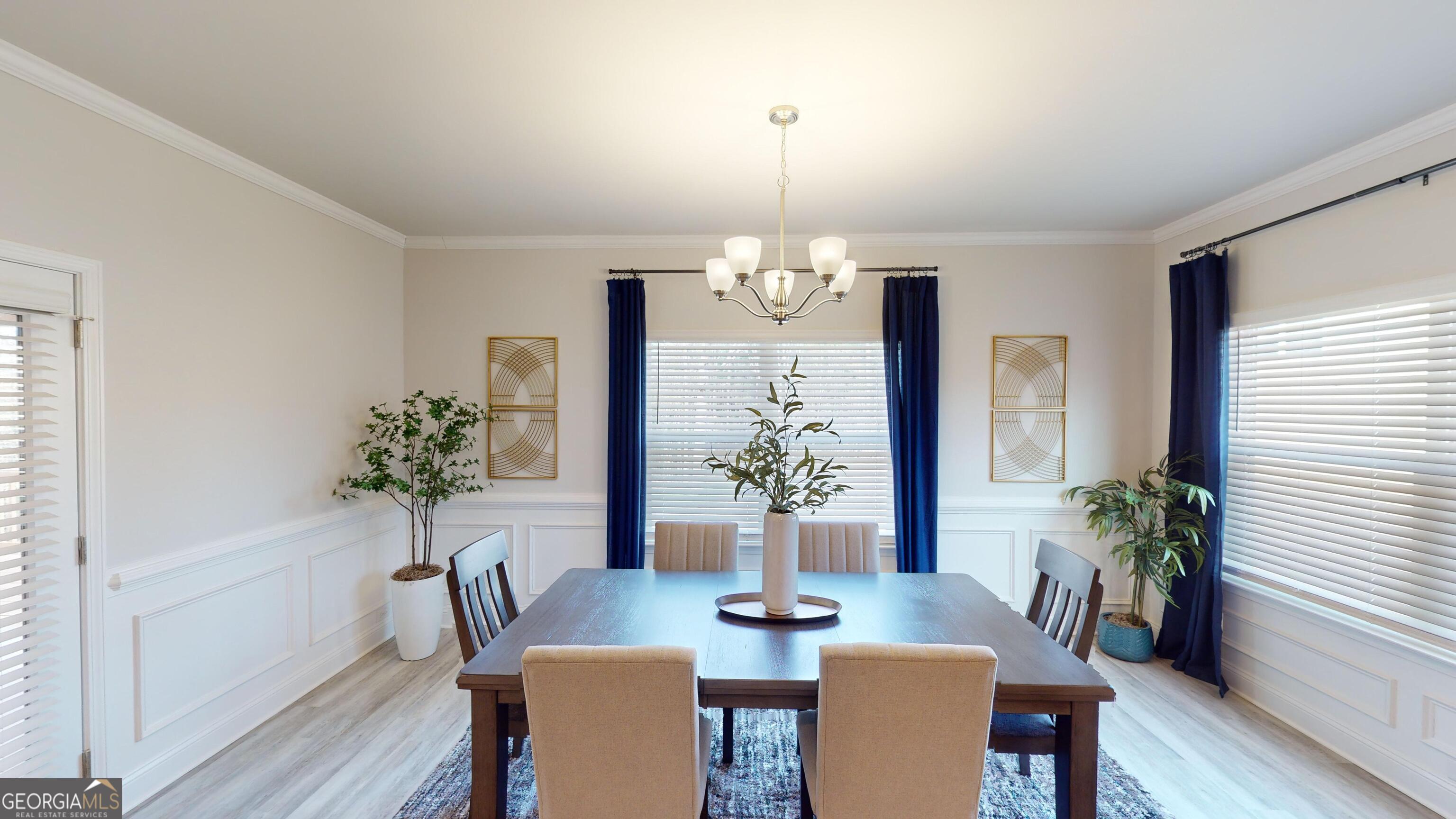 337 Stockton Circle Macon, GA 31216 - Photo 38 of 40 a view of a dining room with furniture and chandelier