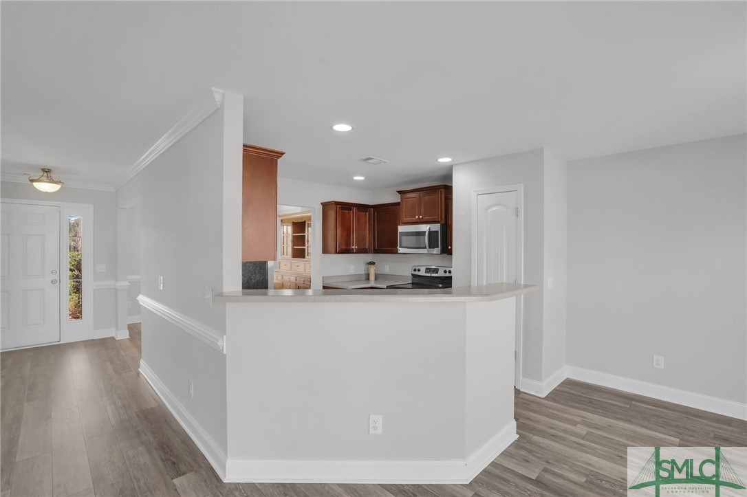 40 Dr Daniel Edwards Street Ellabell, GA 31308 - Photo 14 of 39 14-Kitchen Bar Seating Area