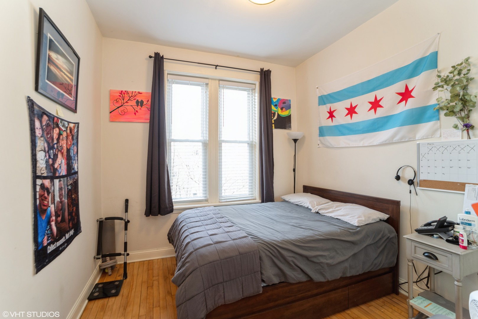 Undisclosed Address Chicago, IL 60647 - Photo 8 of 9 a bedroom with a bed and a window