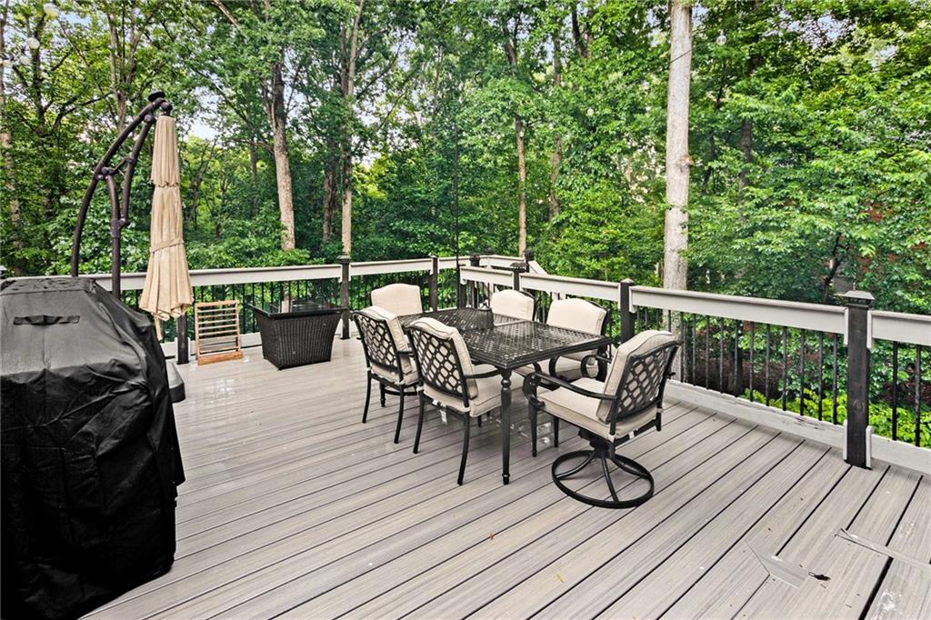 3728 Beaver Creek Road Gainesville, GA 30506 - Photo 19 of 28 a view of a dinning tables and chairs in the balcony