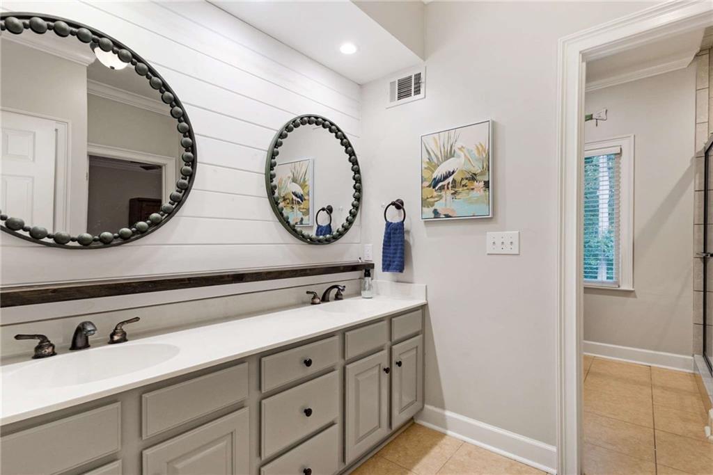 3728 Beaver Creek Road Gainesville, GA 30506 - Photo 8 of 28 a bathroom with a sink and a mirror