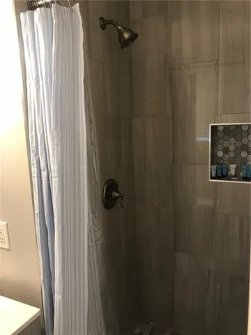 a close view of a shower in the bathroom