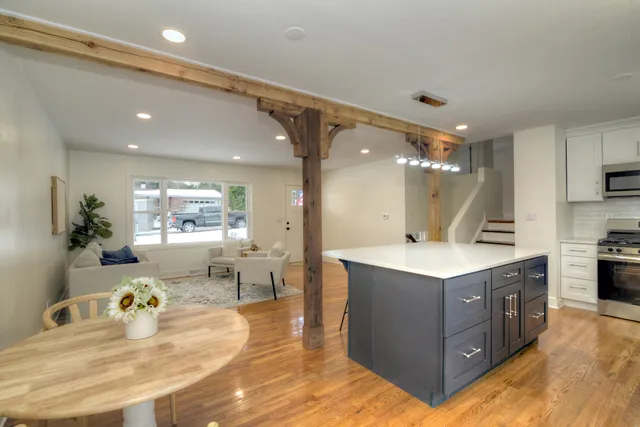 a kitchen with counter top space cabinets and appliances