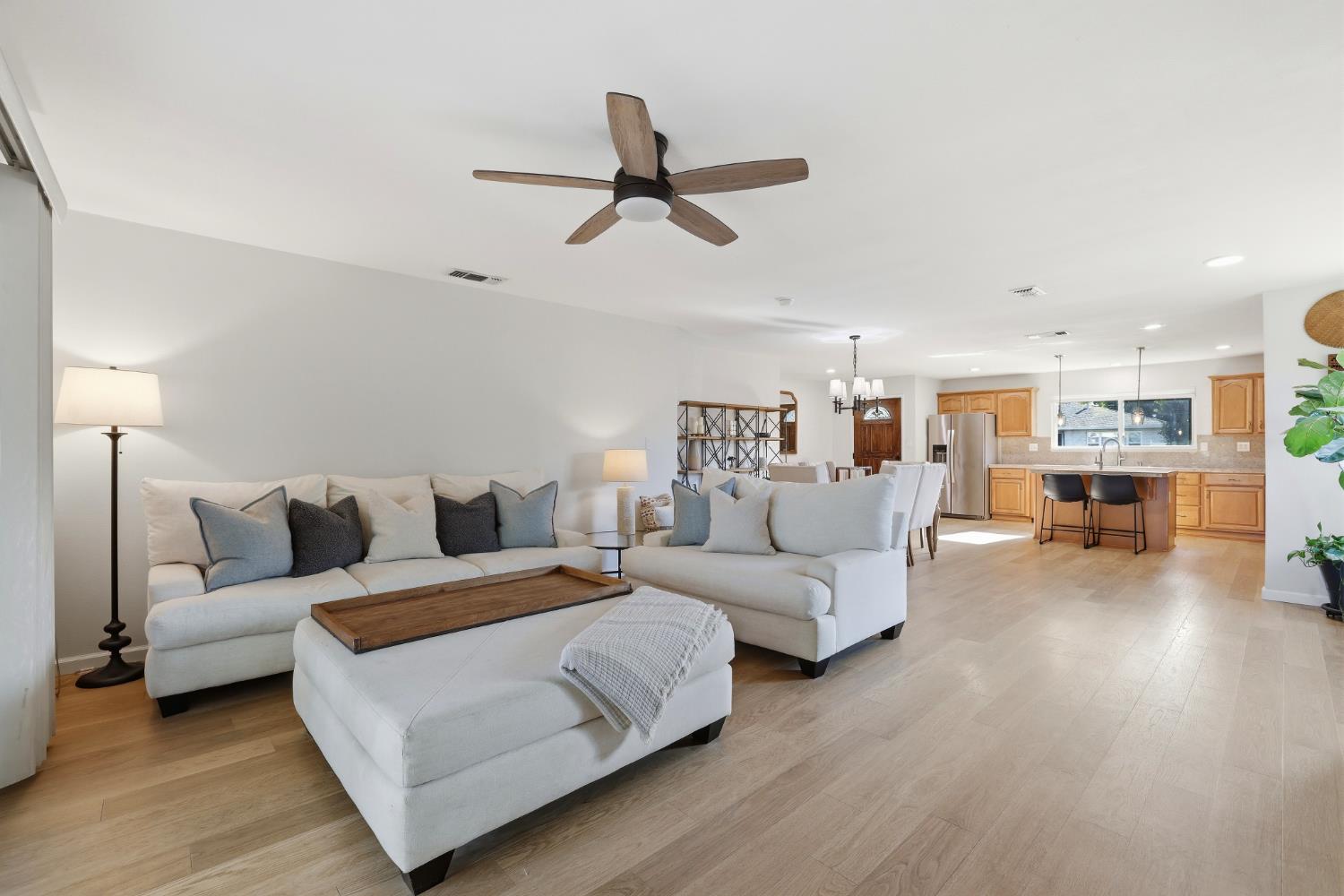 5295 Baumgart Way Carmichael, CA 95608 - Photo 14 of 46 a living room with furniture and a view of kitchen
