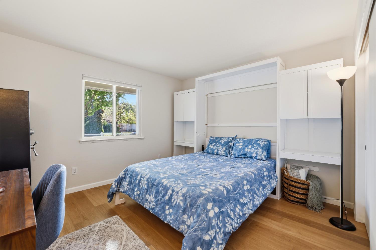 5295 Baumgart Way Carmichael, CA 95608 - Photo 18 of 46 a bedroom with a bed and a chair