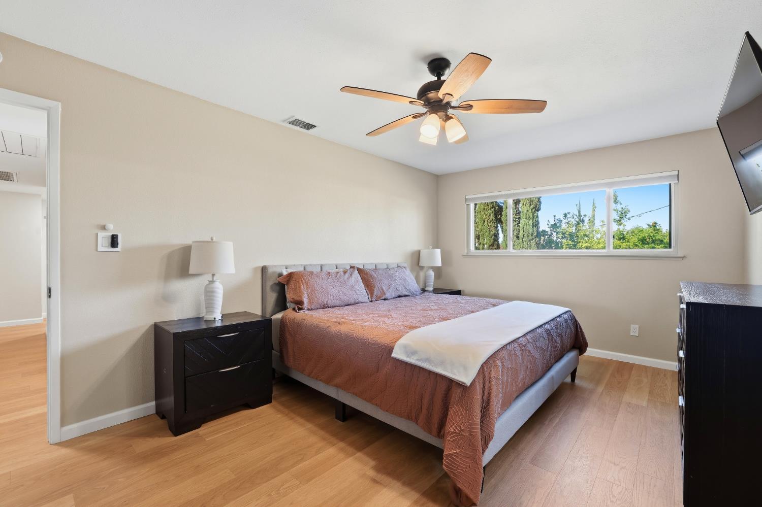 5295 Baumgart Way Carmichael, CA 95608 - Photo 23 of 46 a bedroom with a bed and window
