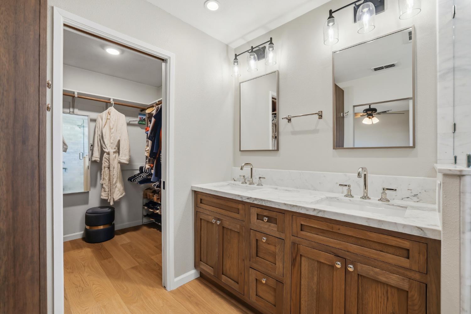 5295 Baumgart Way Carmichael, CA 95608 - Photo 27 of 46 a en suite bathroom with a sink double vanity and a shower