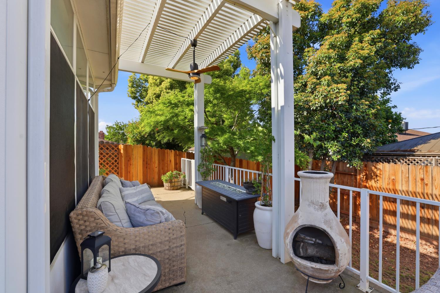 5295 Baumgart Way Carmichael, CA 95608 - Photo 33 of 46 a view of a porch with furniture and a backyard