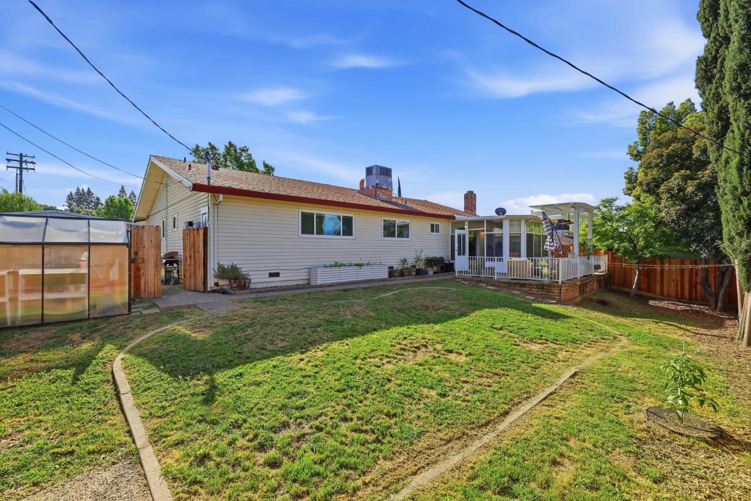 5295 Baumgart Way Carmichael, CA 95608 - Photo 37 of 46 a view of backyard with a garden and plants