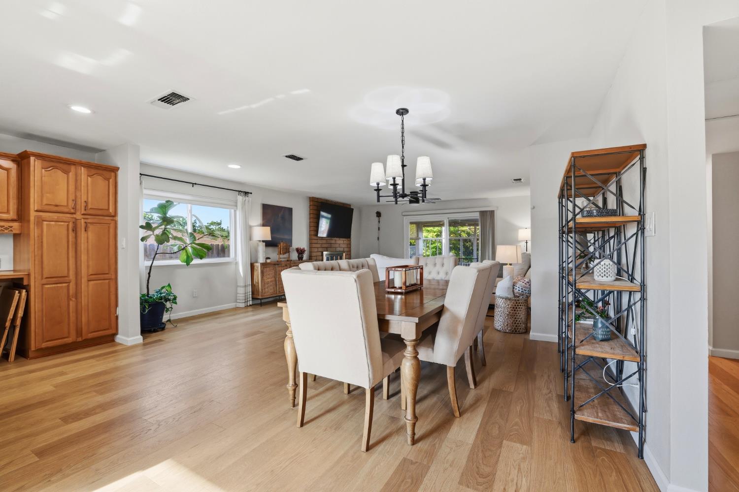 5295 Baumgart Way Carmichael, CA 95608 - Photo 9 of 46 a view of a dining room with furniture window and wooden floor