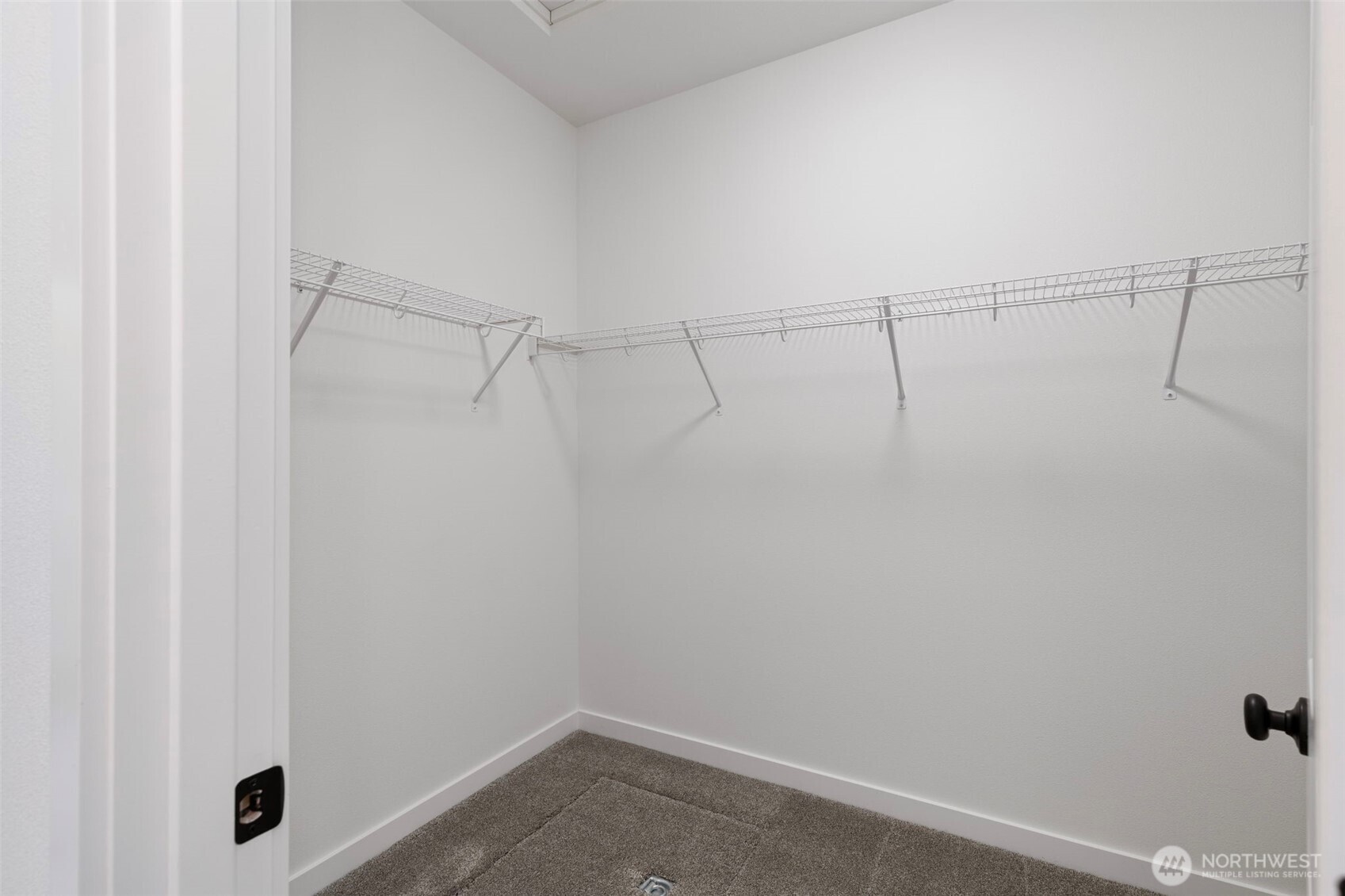101 Northeast Anvil Lane Belfair, WA 98528 - Photo 20 of 40 a view of a room with racks on the wall