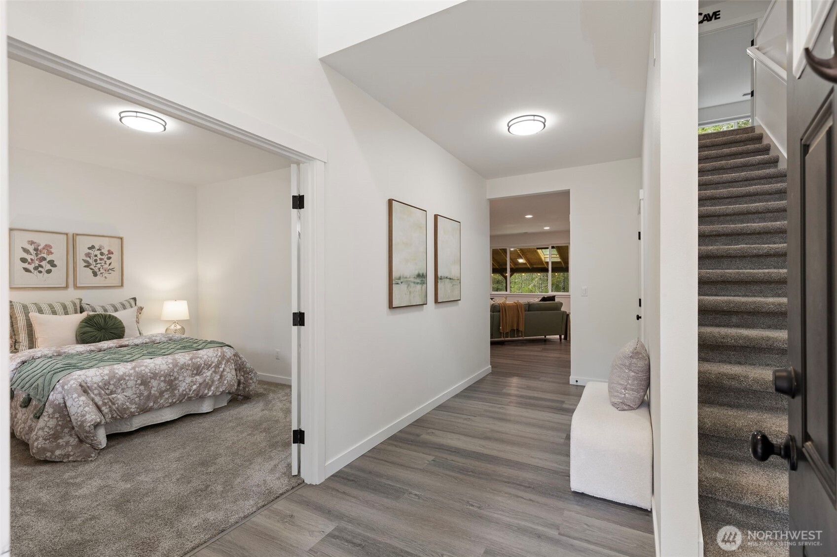 101 Northeast Anvil Lane Belfair, WA 98528 - Photo 22 of 40 a bedroom with furniture and white walls
