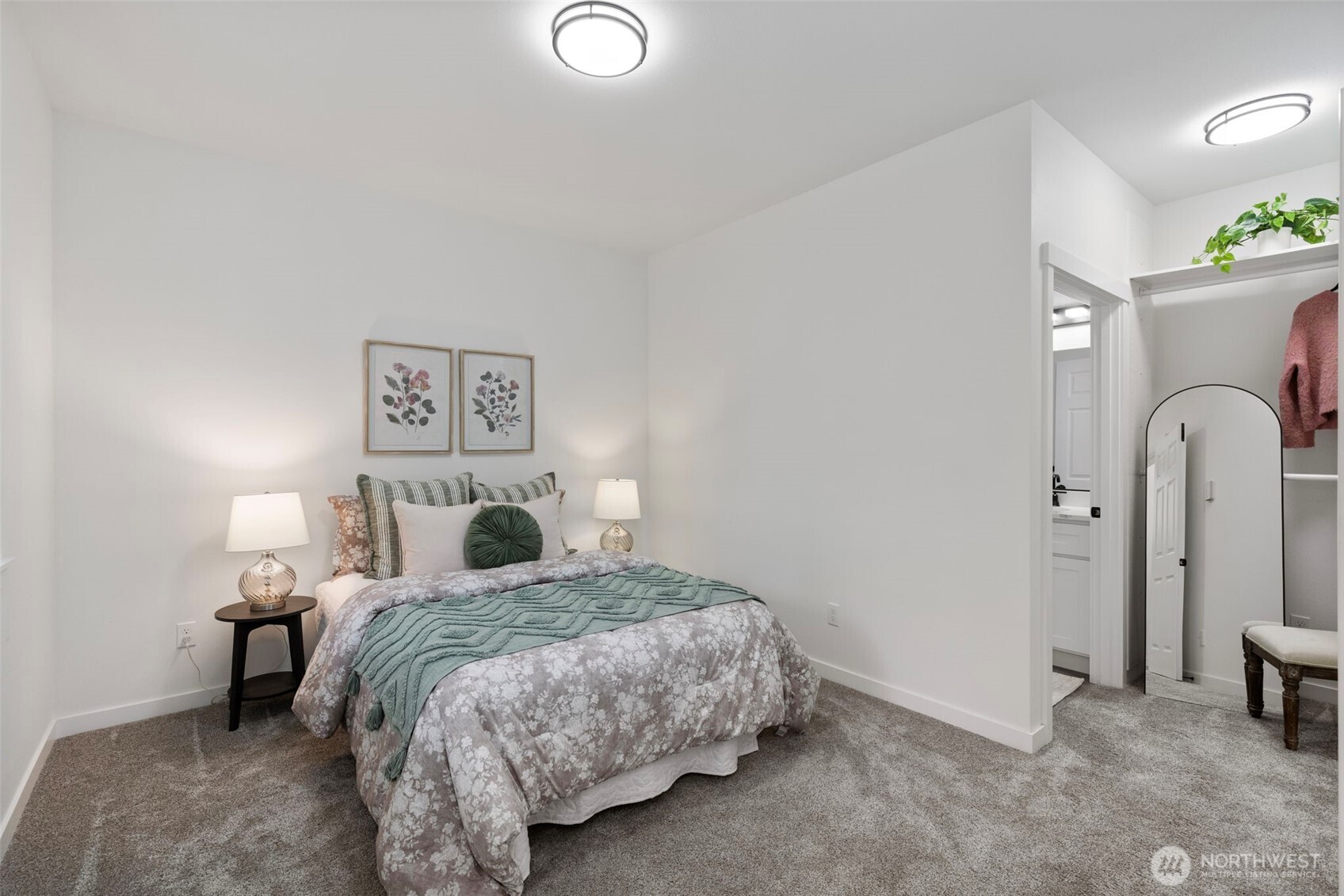101 Northeast Anvil Lane Belfair, WA 98528 - Photo 23 of 40 a bedroom with a bed and a table
