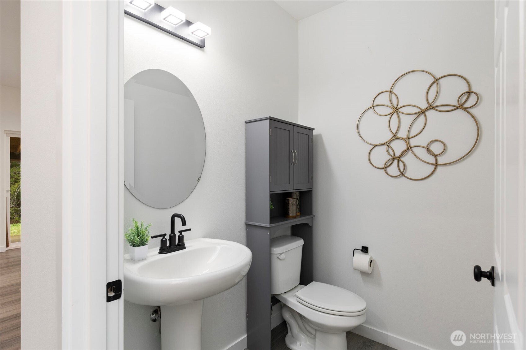 101 Northeast Anvil Lane Belfair, WA 98528 - Photo 26 of 40 a bathroom with a sink mirror and toilet