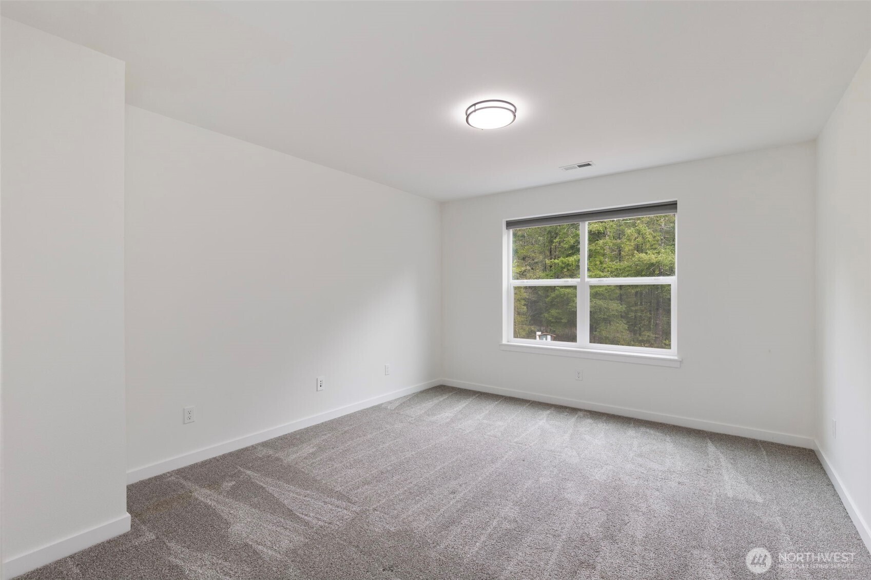101 Northeast Anvil Lane Belfair, WA 98528 - Photo 31 of 40 an empty room with a window