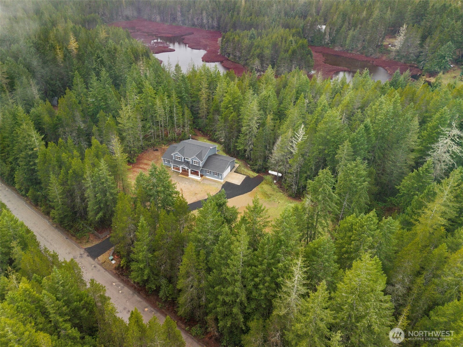 101 Northeast Anvil Lane Belfair, WA 98528 - Photo 40 of 40 a view of a yard