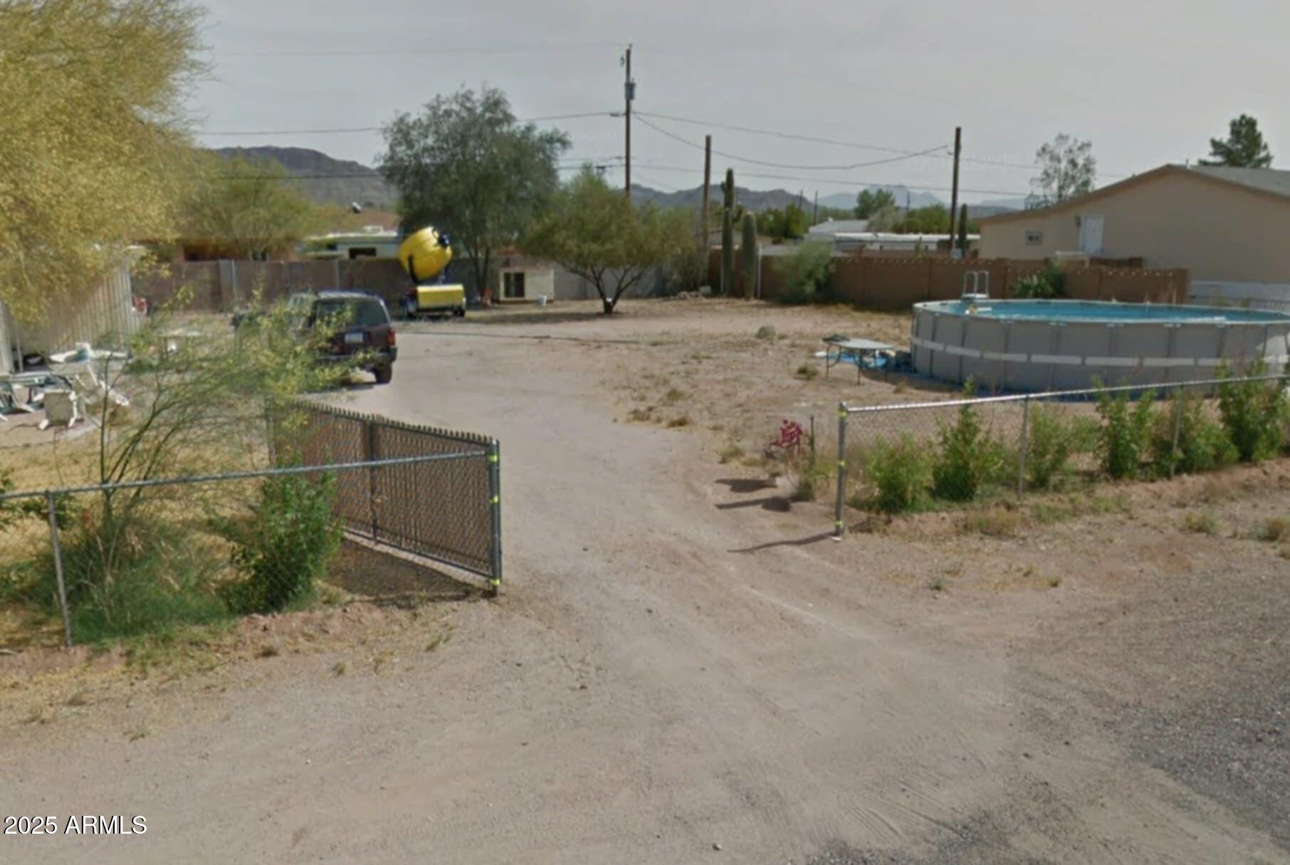 2926 West Roundup Street Apache Junction, AZ 85120 - Photo 2 of 2 a view of a backyard