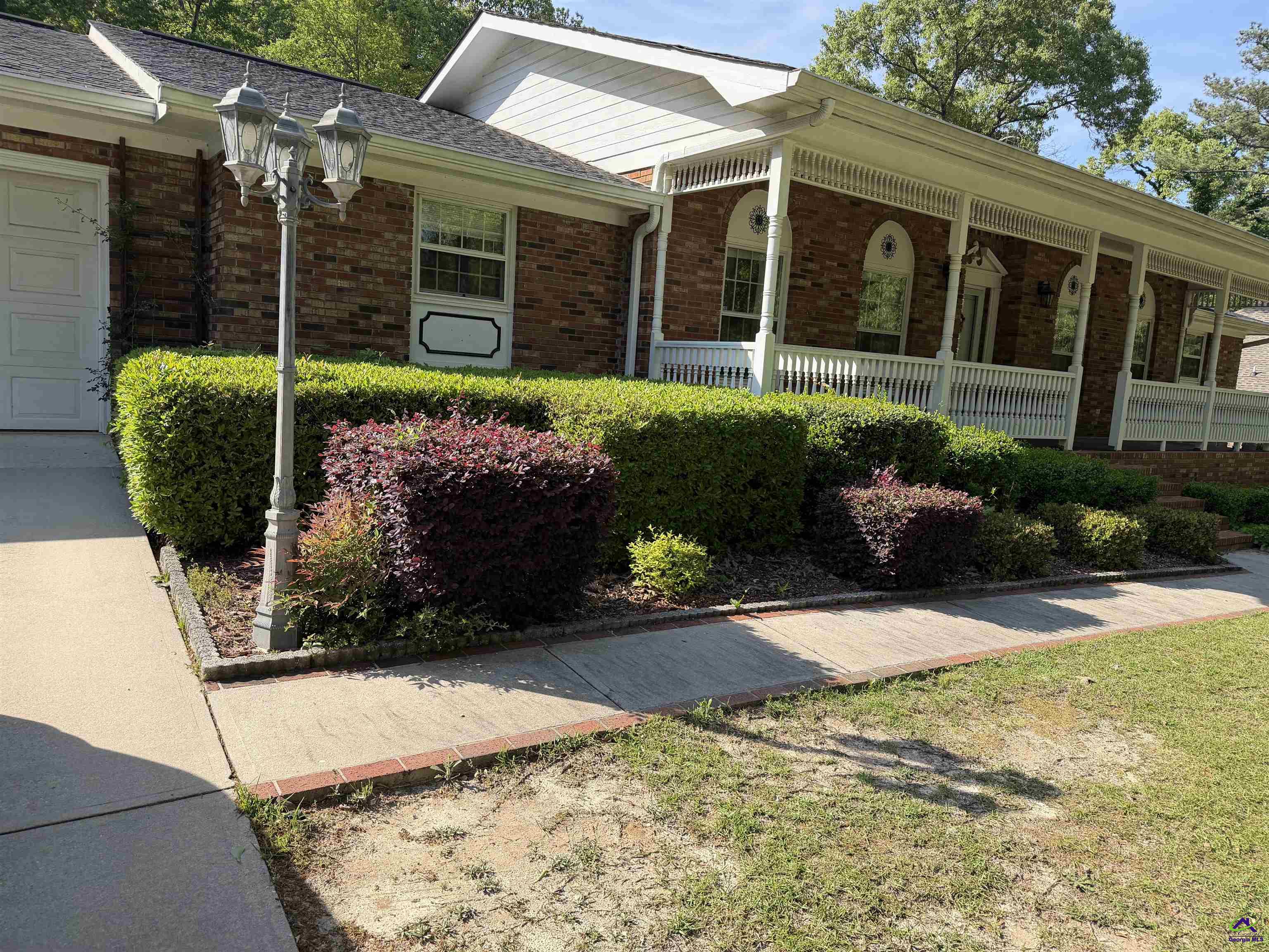 249 Hatcher Road Warner Robins, GA 31088 - Photo 4 of 25 a view of a house with backyard and garden