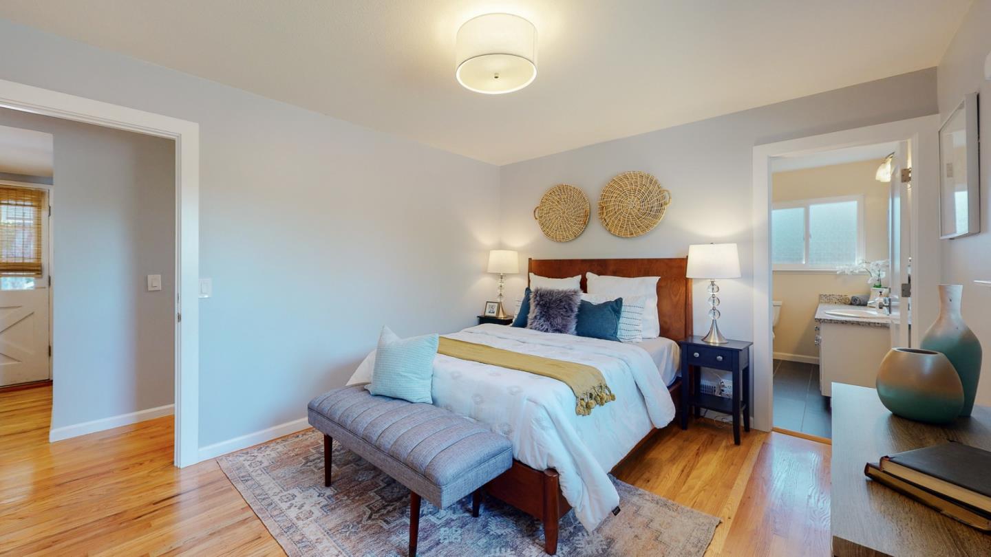 5378 Carter Avenue San Jose, CA 95118 - Photo 16 of 38 a bedroom with a bed and wooden floor