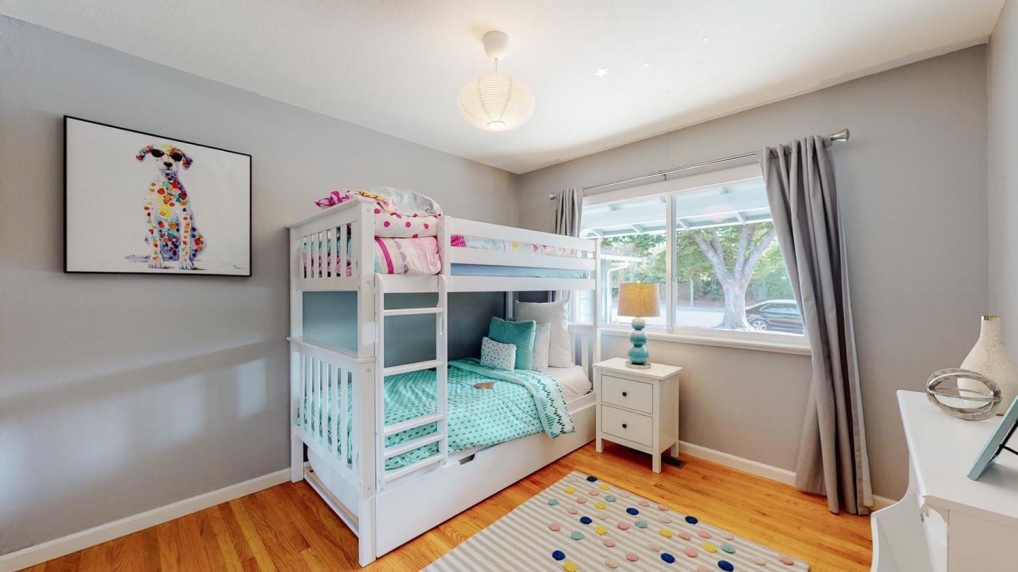 5378 Carter Avenue San Jose, CA 95118 - Photo 20 of 38 a bedroom with a bed and a window