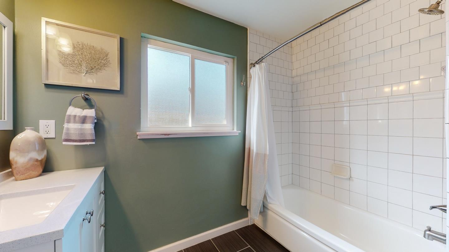 5378 Carter Avenue San Jose, CA 95118 - Photo 23 of 38 a bathroom with a bathtub sink and toilet