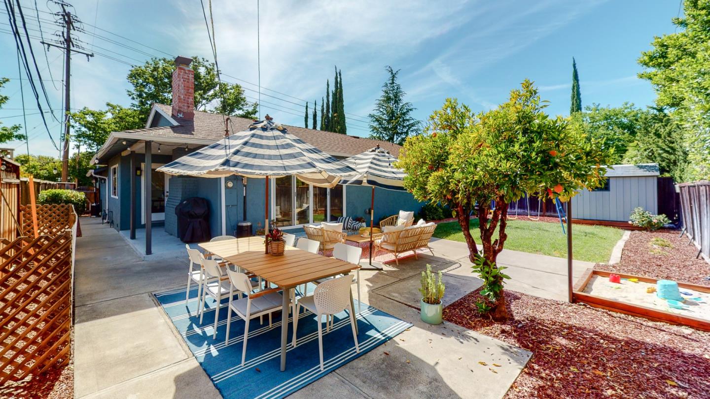 5378 Carter Avenue San Jose, CA 95118 - Photo 30 of 38 a view of a patio with a table and chairs