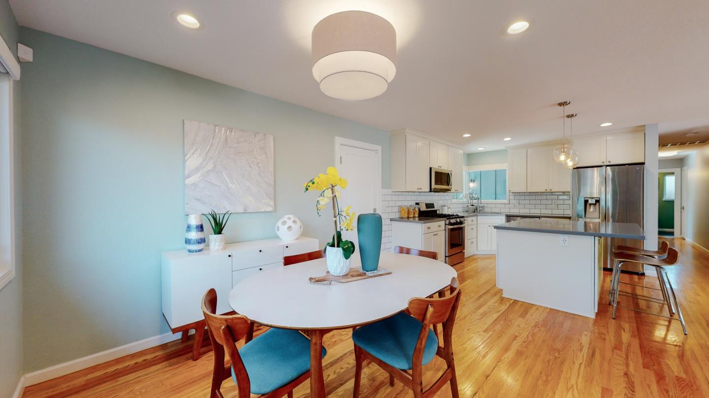 5378 Carter Avenue San Jose, CA 95118 - Photo 10 of 38 a view of a dining room with furniture and wooden floor