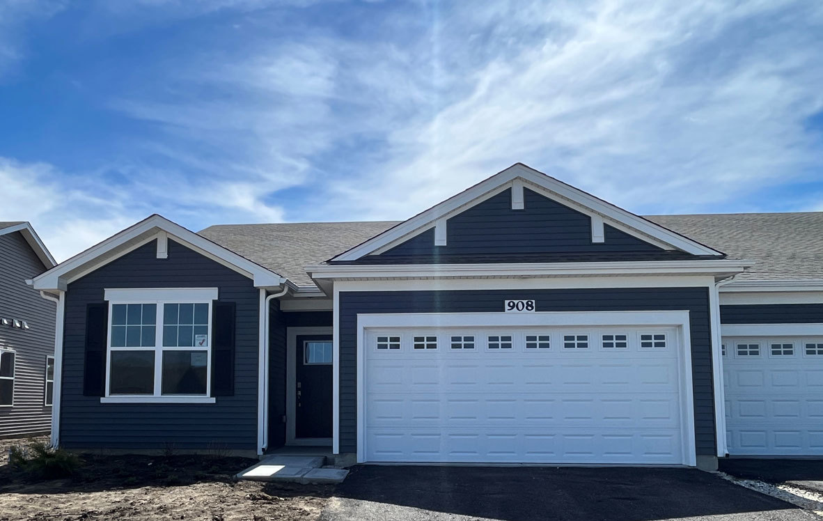 316 Ridley Street North Aurora, IL 60542 - Photo 1 of 45 a front view of a house with a garden