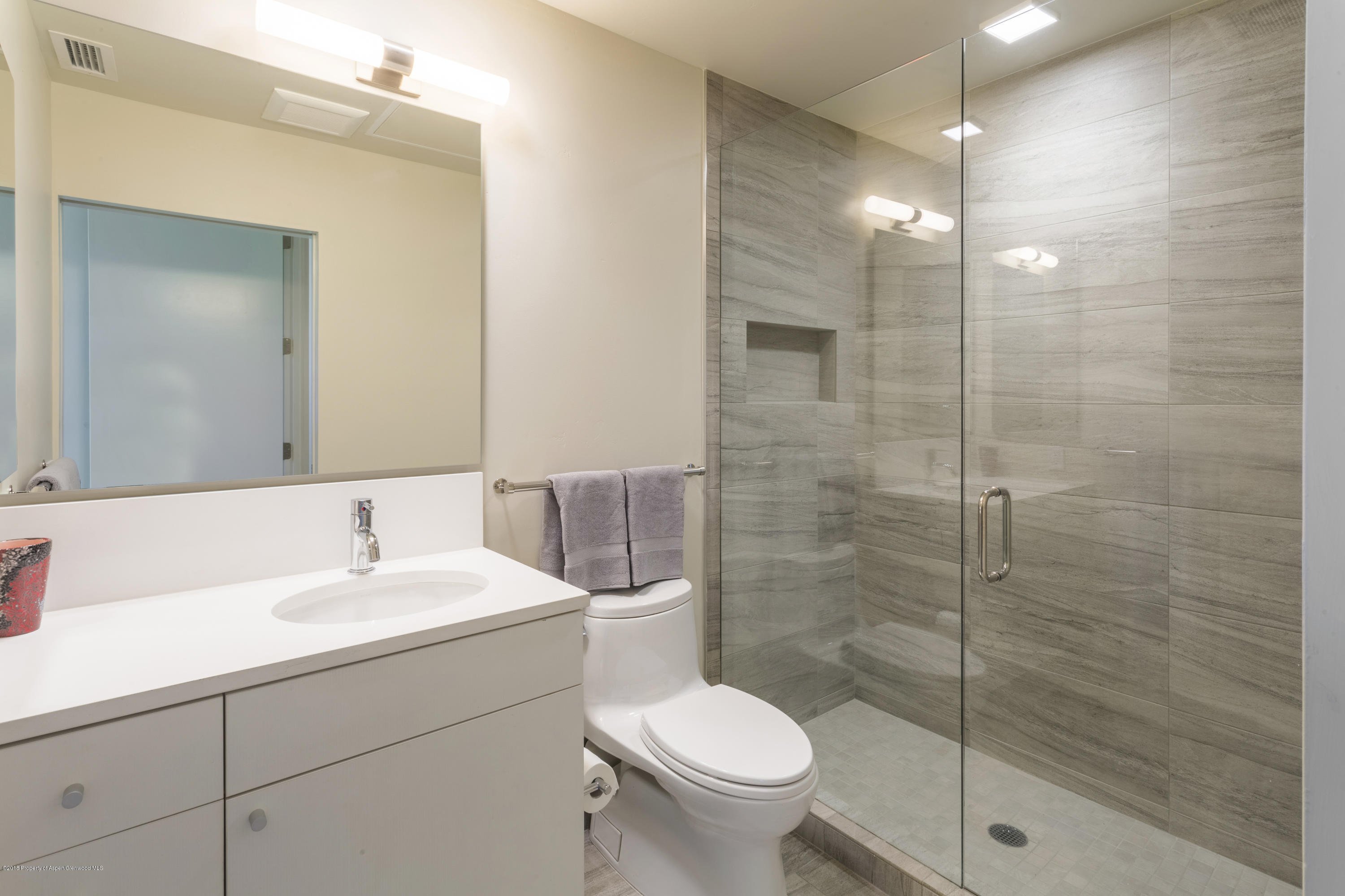 100 Evans Road, Unit 205 Basalt, CO 81621 - Photo 17 of 25 a bathroom with a sink toilet and shower