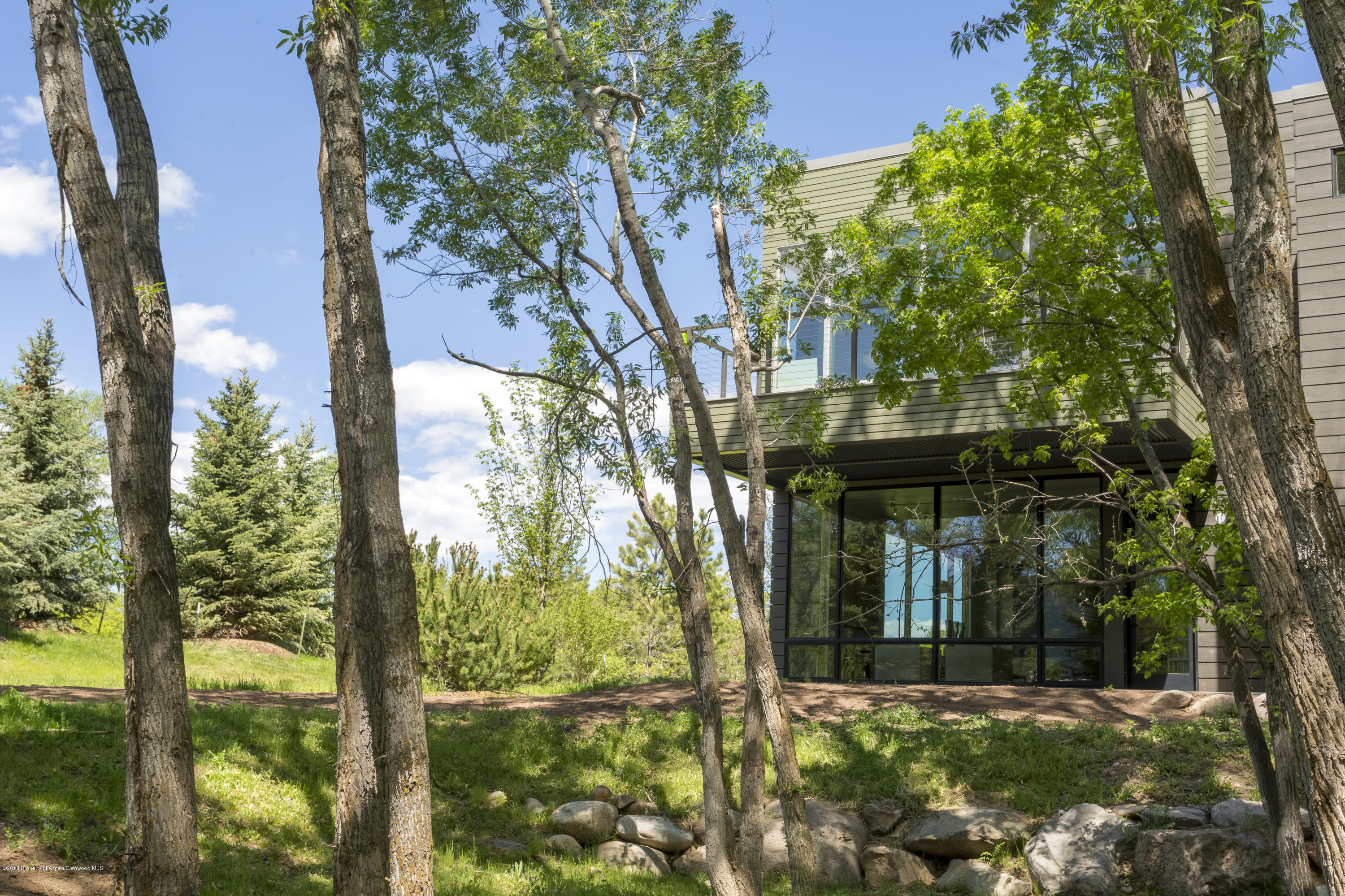 100 Evans Road, Unit 205 Basalt, CO 81621 - Photo 21 of 25 a view of a house with a tree