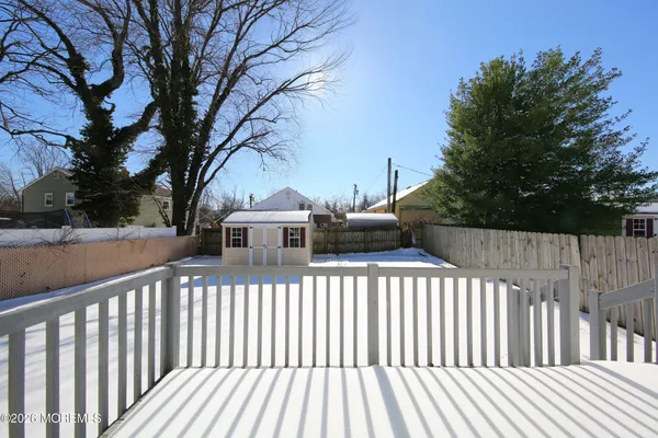 a view of a wooden roof deck
