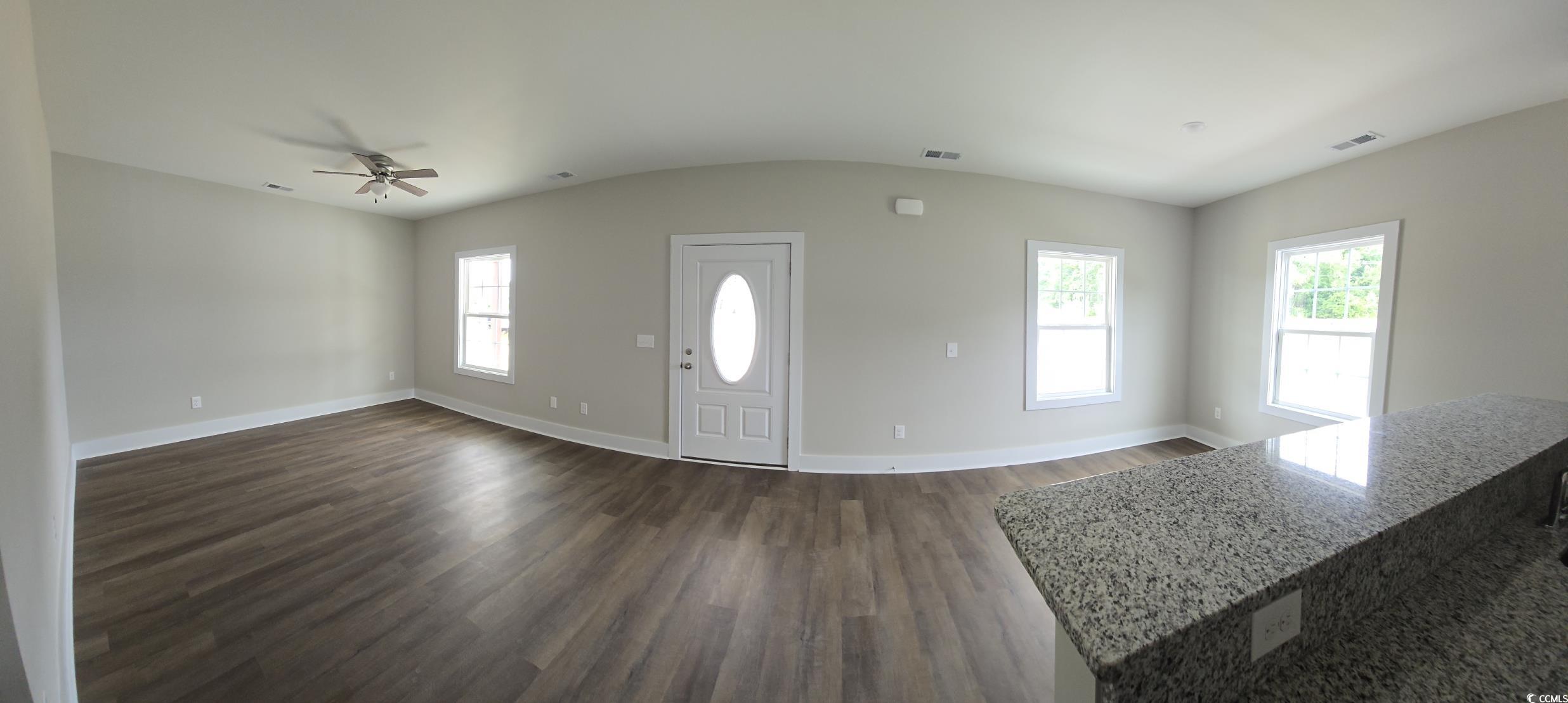 4890 Highway 319 Aynor, SC 29511 - Photo 11 of 21 Foyer featuring dark wood-style floors, ceiling fan, and vaulted ceiling