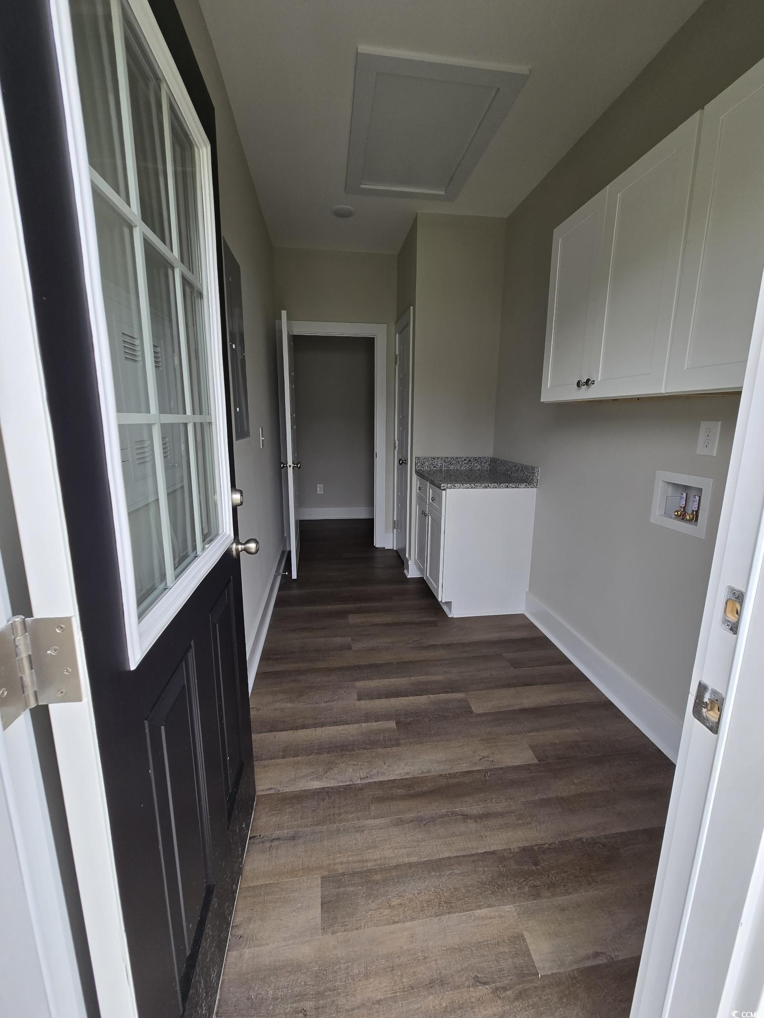 4890 Highway 319 Aynor, SC 29511 - Photo 14 of 21 Laundry room featuring cabinet space, dark wood-style floors, and washer hookup